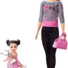 Barbie Ice-Skating Dolls & Playset with Blonde Coach Doll, Brunette Small Doll and Ice-Skating Base with Turning Mechanism