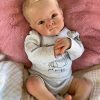 Reborn Baby Dolls 22 inch Baby Reborn Toddler Lifelike Baby Dolls Realistic Reborn Doll Long Brown Hair Pink Giraffe Toy Accessories for Collectors 4