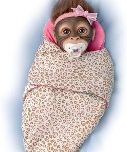 The Ashton-Drake Galleries So Truly Real Snuggle Suri Vinyl Monkey Baby Doll with Hand-Applied Mohair, Custom-Designed Animal Print Bunting and Pacifier 2